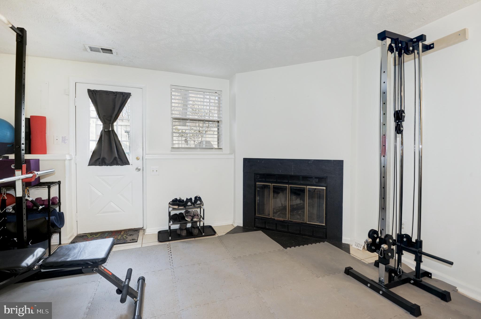 1598 Woodcrest Drive Reston, VA 20194 - Photo 25 of 34 Basement with fireplace