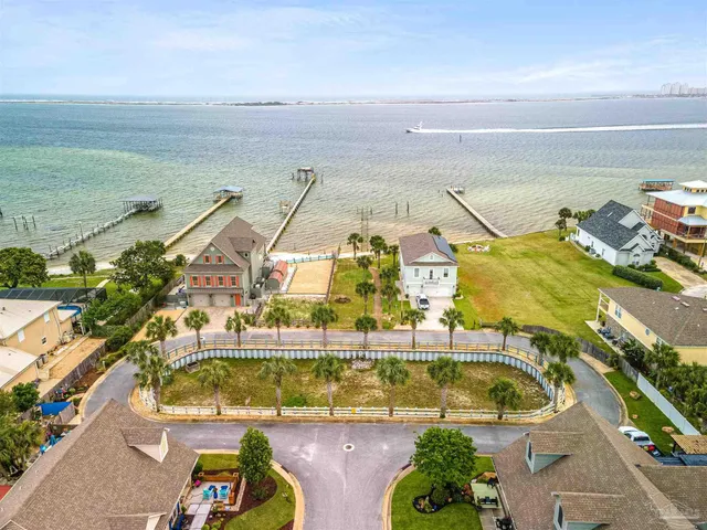 a view of a swimming pool with an ocean view