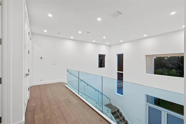 a bathroom with a granite countertop sink mirror and double