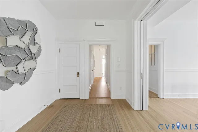 a view of entryway with wooden floor