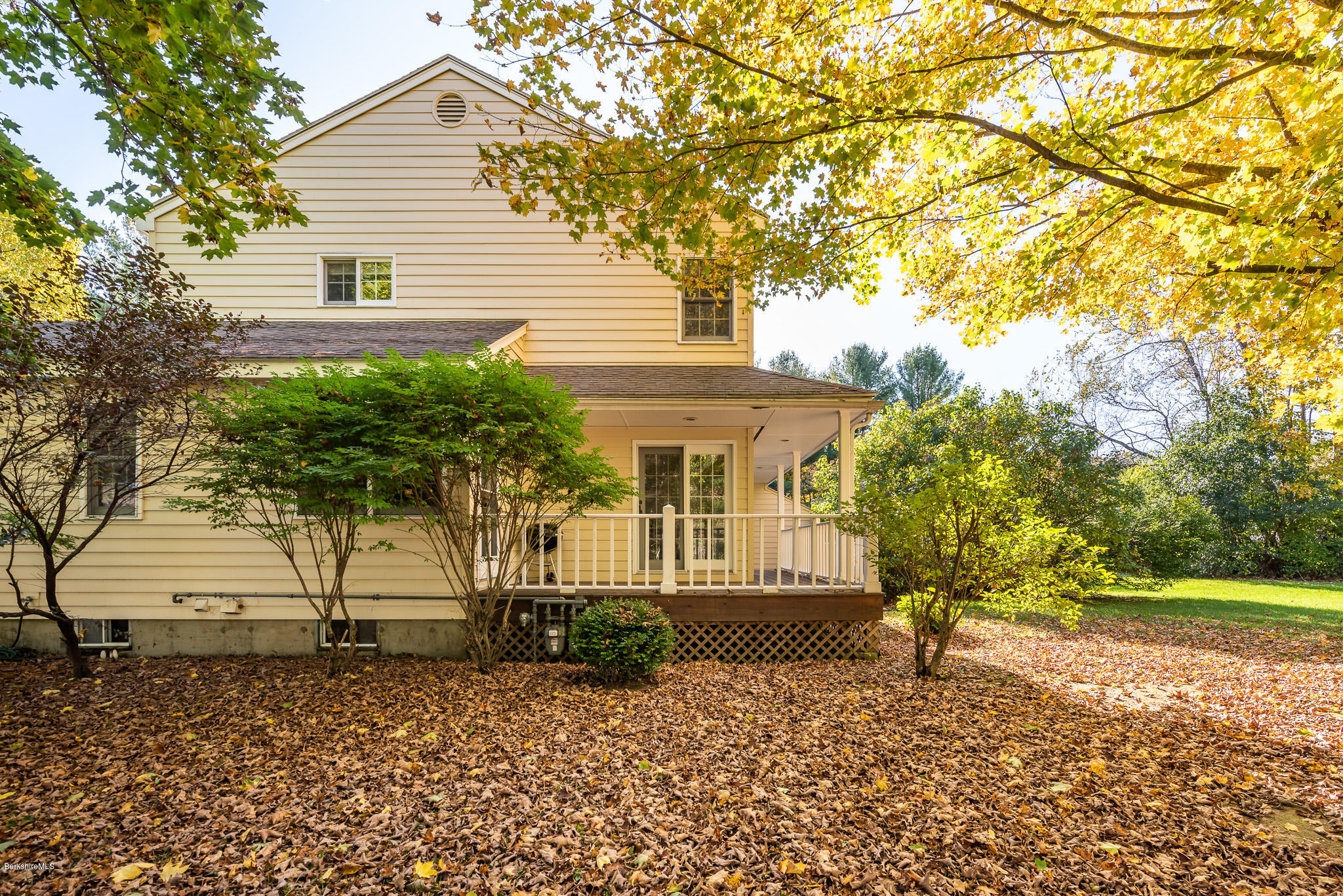 1136 Barker Road, Unit 28 Pittsfield, MA 01201 - Photo 2 of 34 a view of a house with a yard