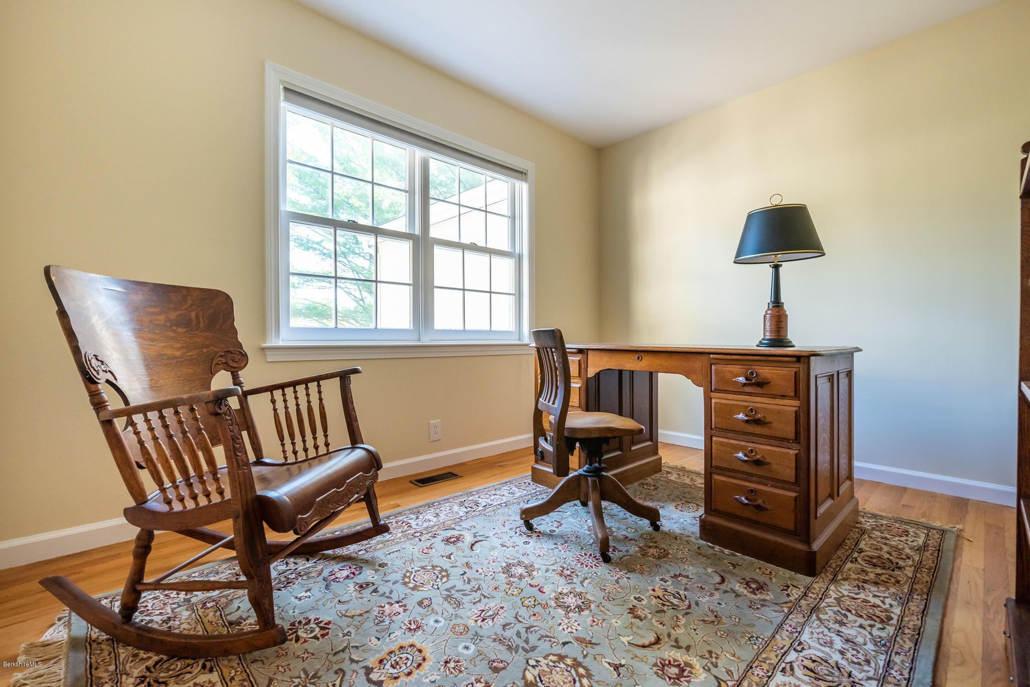 1136 Barker Road, Unit 28 Pittsfield, MA 01201 - Photo 15 of 34 a bedroom with a chair and a window