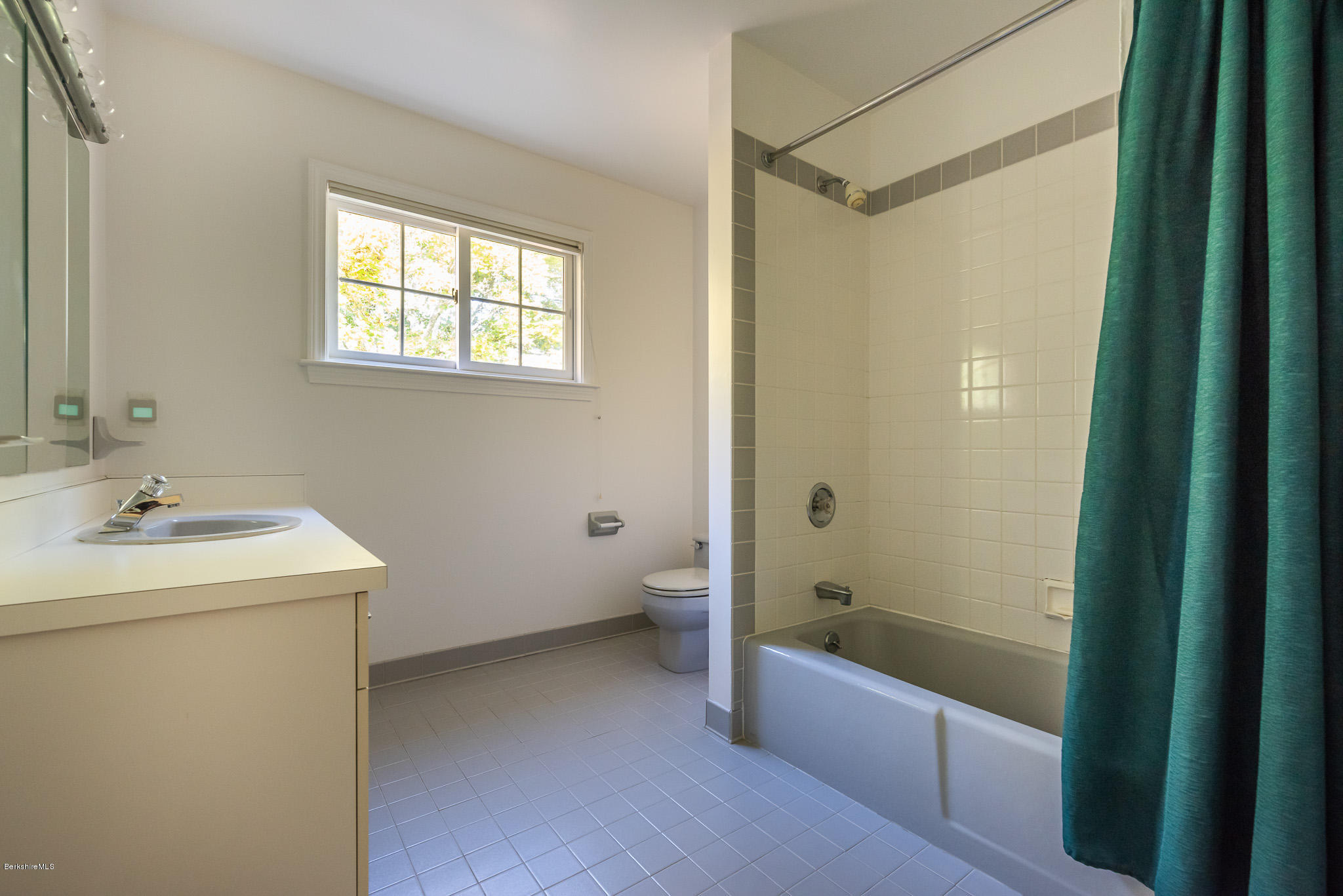 1136 Barker Road, Unit 28 Pittsfield, MA 01201 - Photo 19 of 34 a bathroom with a sink a toilet and shower