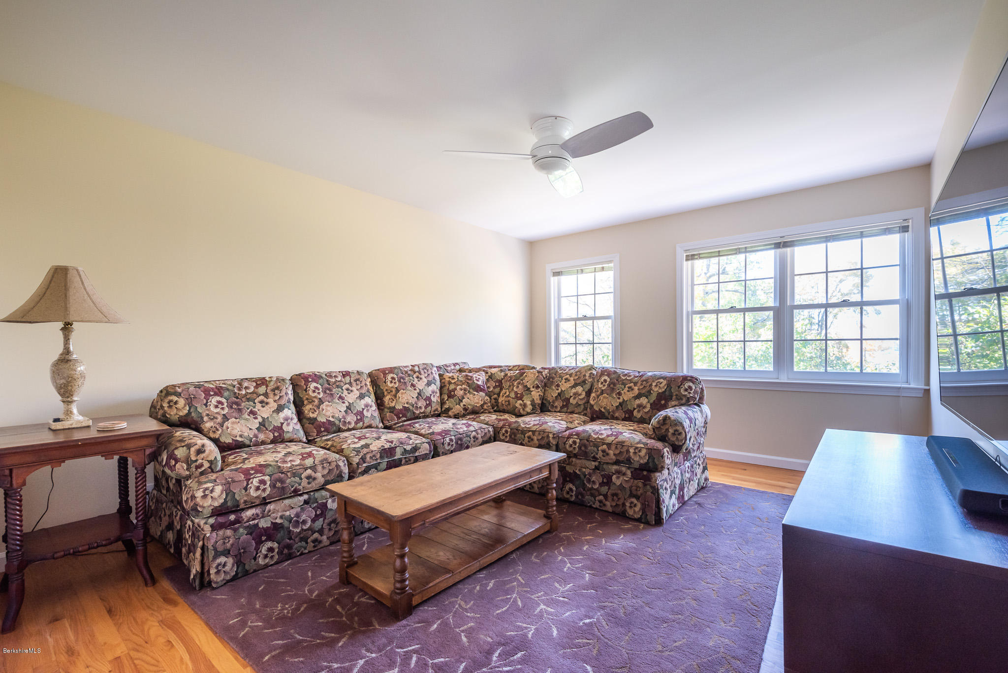 1136 Barker Road, Unit 28 Pittsfield, MA 01201 - Photo 20 of 34 a living room with furniture and a large window