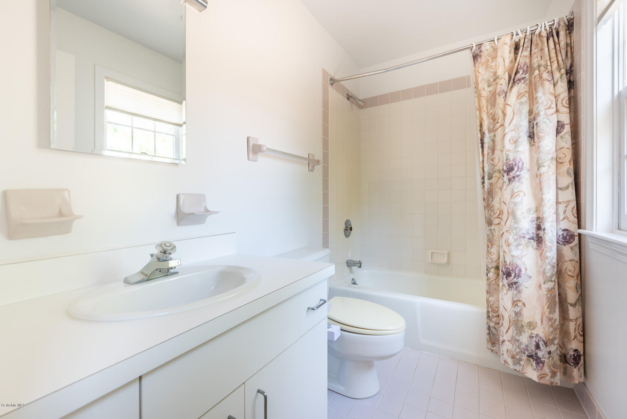 1136 Barker Road, Unit 28 Pittsfield, MA 01201 - Photo 22 of 34 a bathroom with a sink a toilet and shower