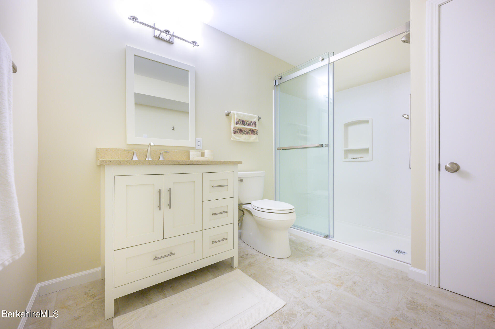 1136 Barker Road, Unit 28 Pittsfield, MA 01201 - Photo 27 of 34 a bathroom with a toilet sink and shower
