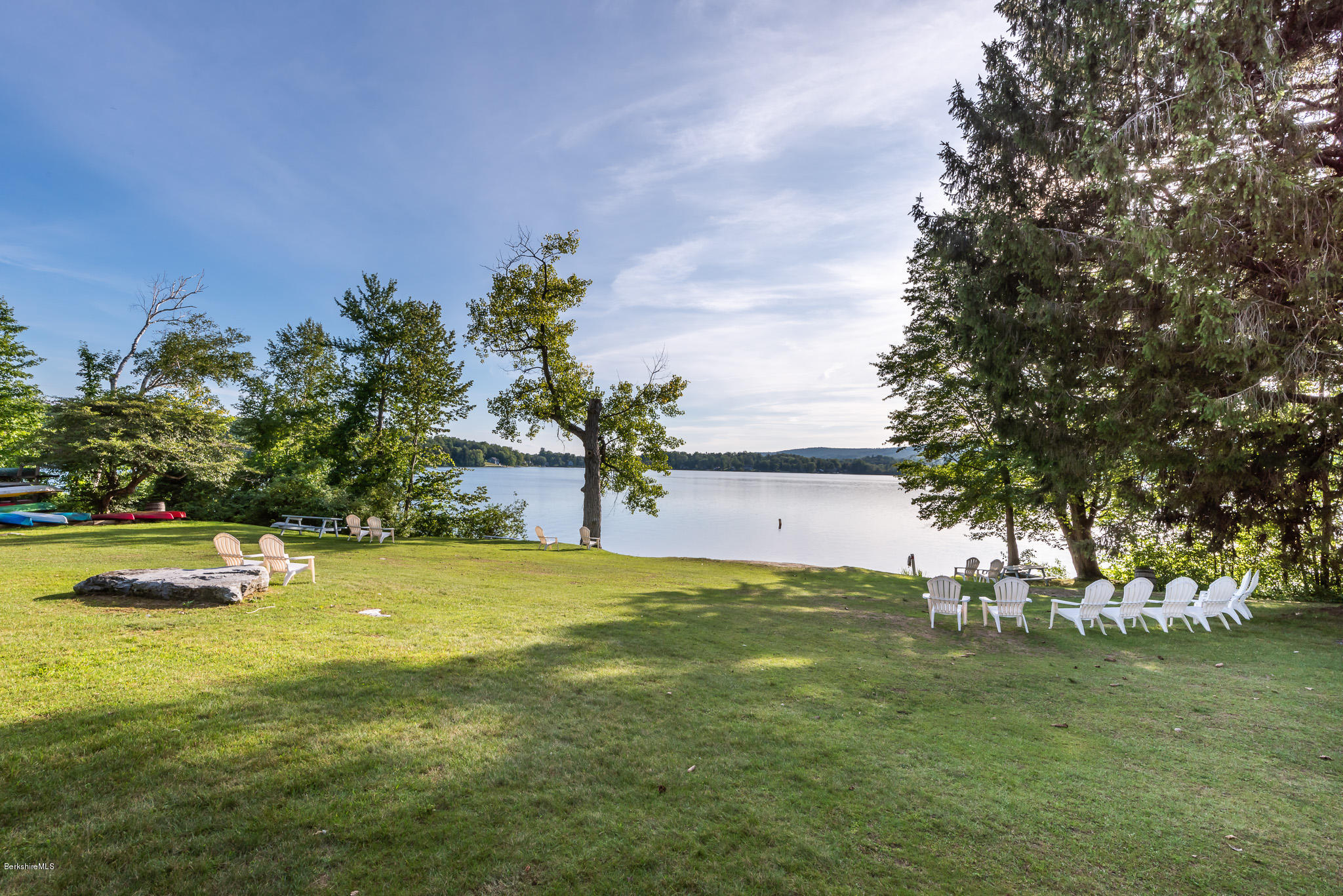 1136 Barker Road, Unit 28 Pittsfield, MA 01201 - Photo 30 of 34 a view of a swimming pool with an outdoor space and seating area