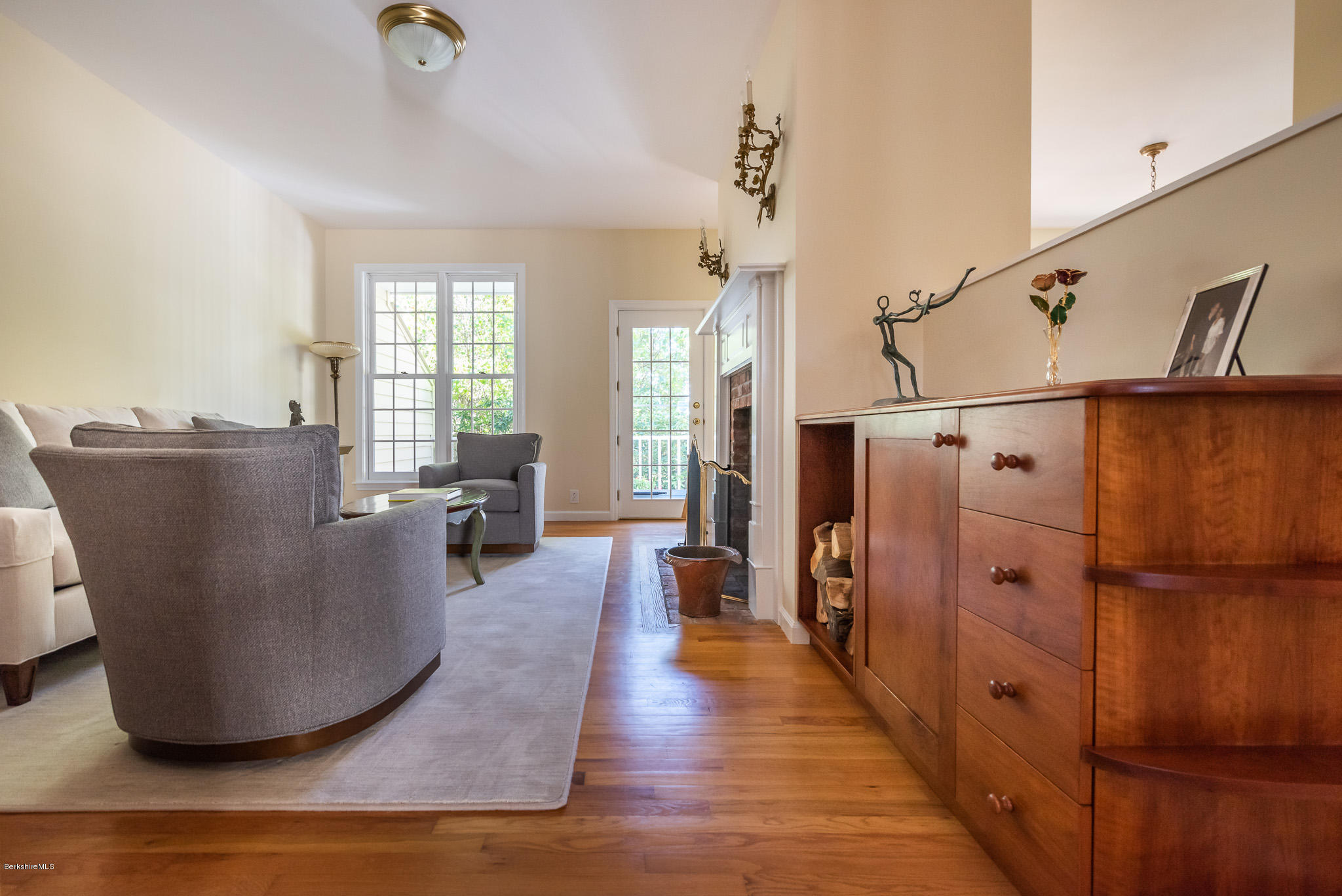 1136 Barker Road, Unit 28 Pittsfield, MA 01201 - Photo 6 of 34 a view of a living room and a wooden floor