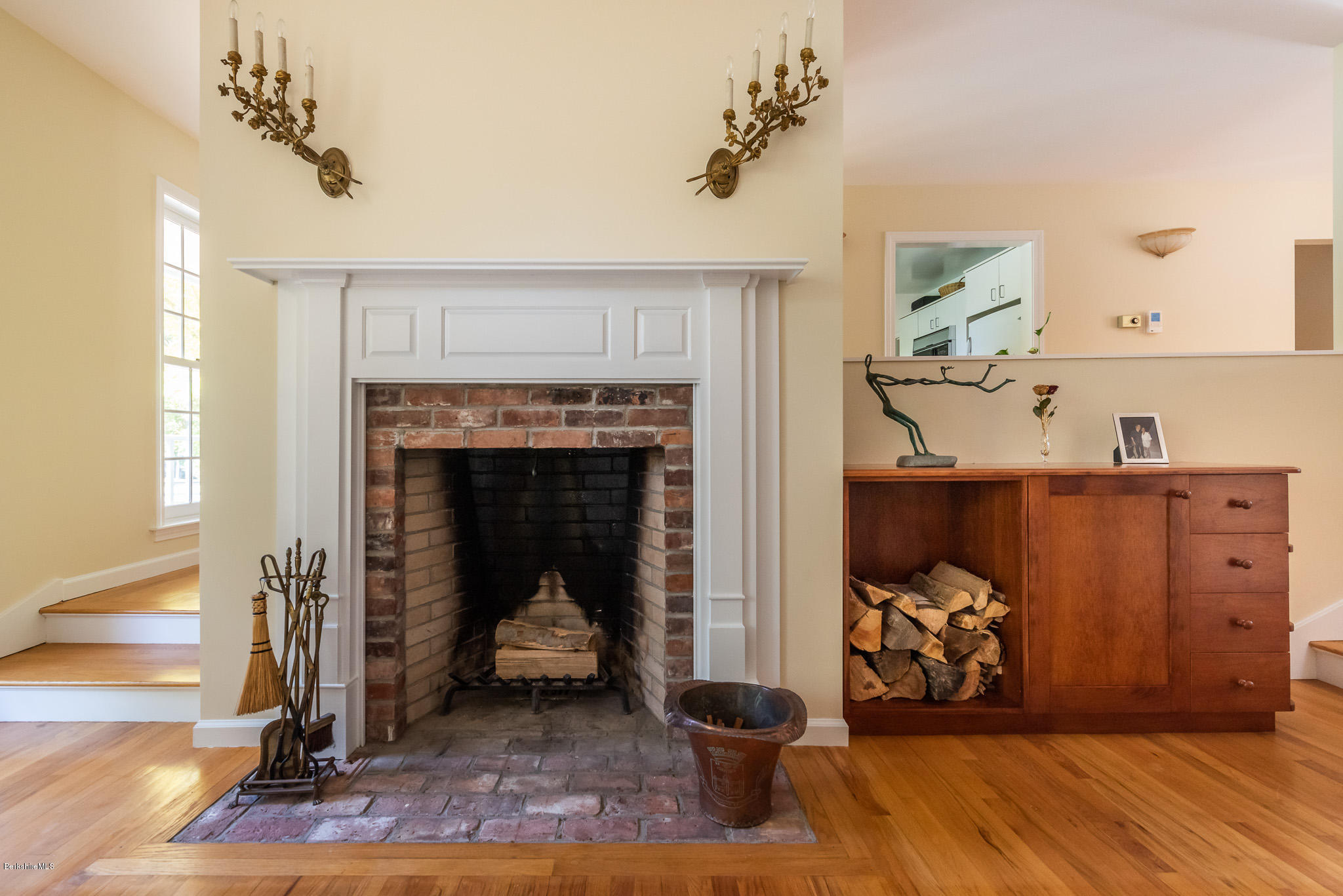 1136 Barker Road, Unit 28 Pittsfield, MA 01201 - Photo 8 of 34 a living room with furniture and a fireplace