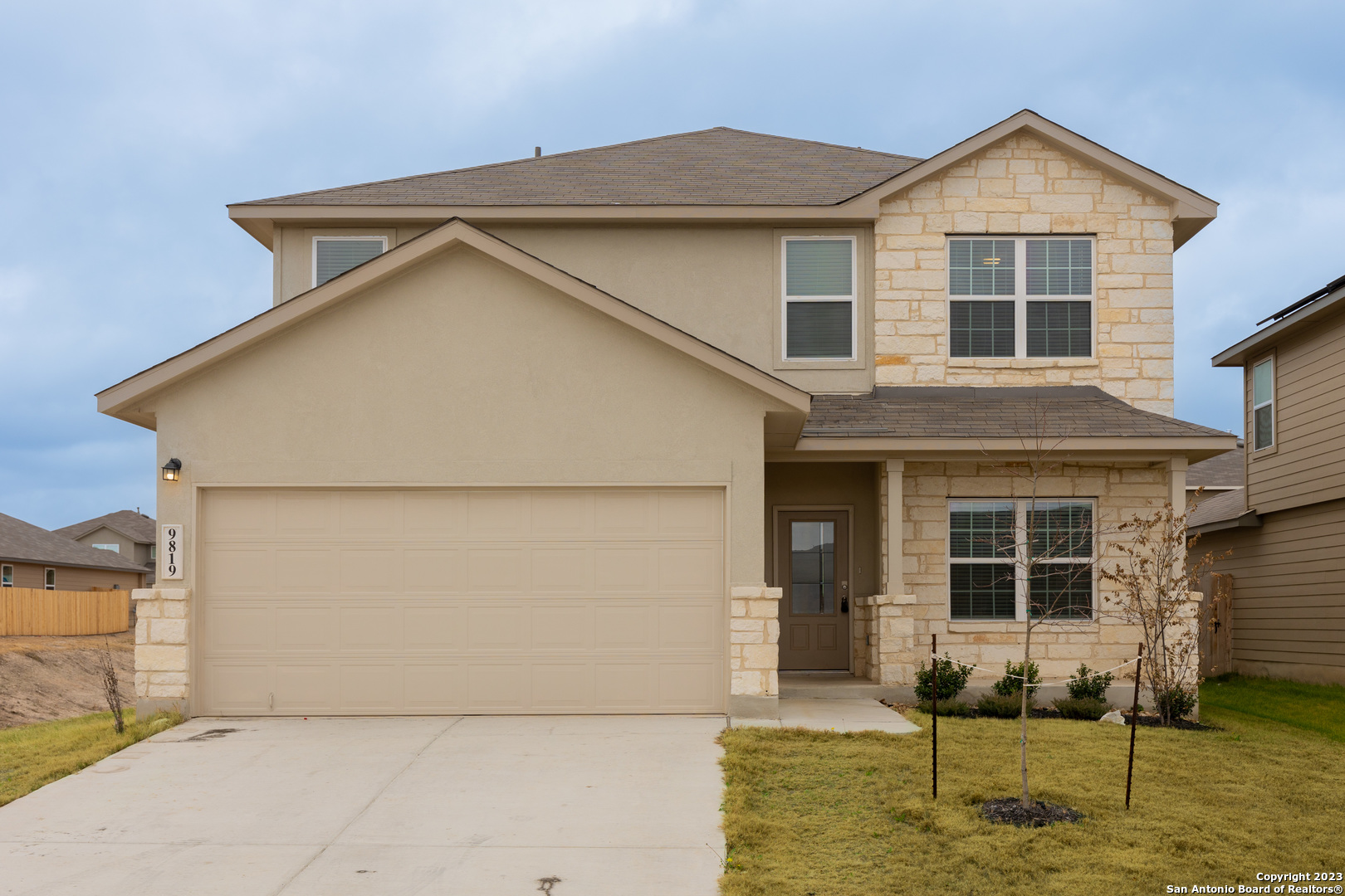 9819 Bratten Rise San Antonio, TX 78254 - Photo 1 of 37 a front view of a house with garden