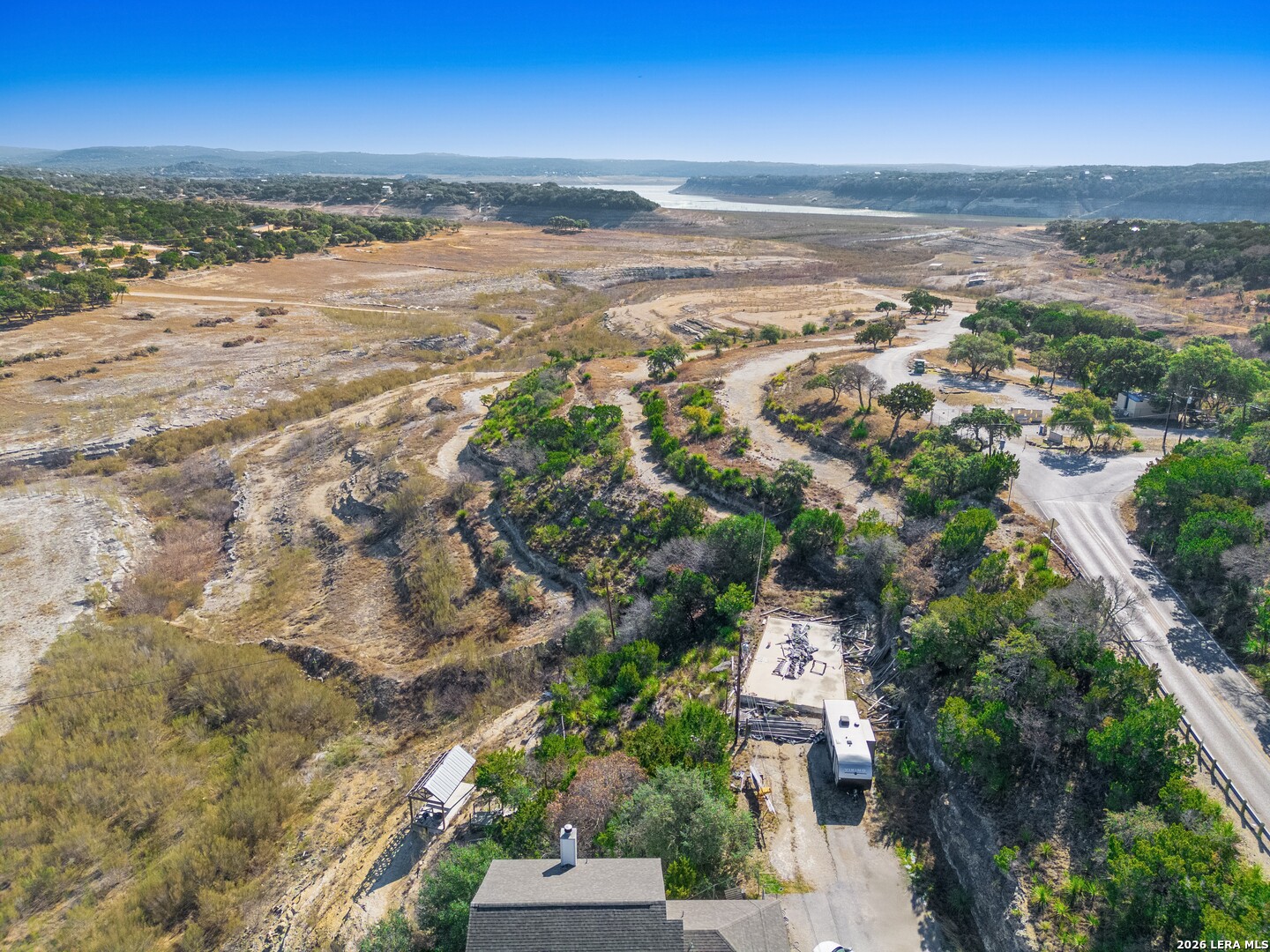 273 Plum Cove Road Lakehills, TX 78063 - Photo 6 of 10 an aerial view of ocean and residential houses with outdoor space