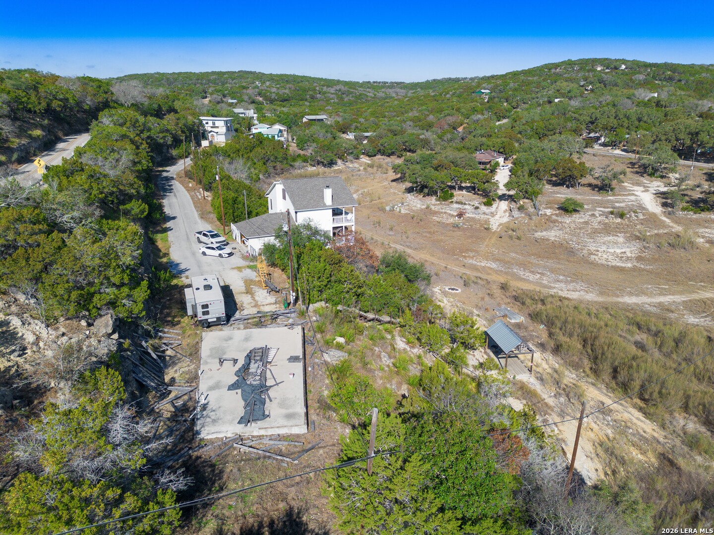 273 Plum Cove Road Lakehills, TX 78063 - Photo 7 of 10 an aerial view of residential houses with outdoor space and trees