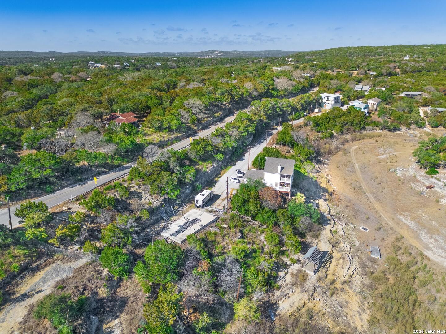 273 Plum Cove Road Lakehills, TX 78063 - Photo 8 of 10 an aerial view of residential houses with outdoor space and trees
