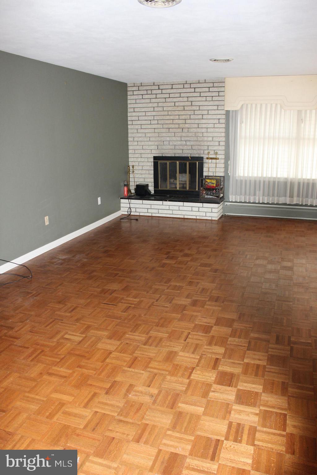 24 Carrolls Tract Road Fairfield, PA 17320 - Photo 11 of 47 Living Room with wood-burning fireplace