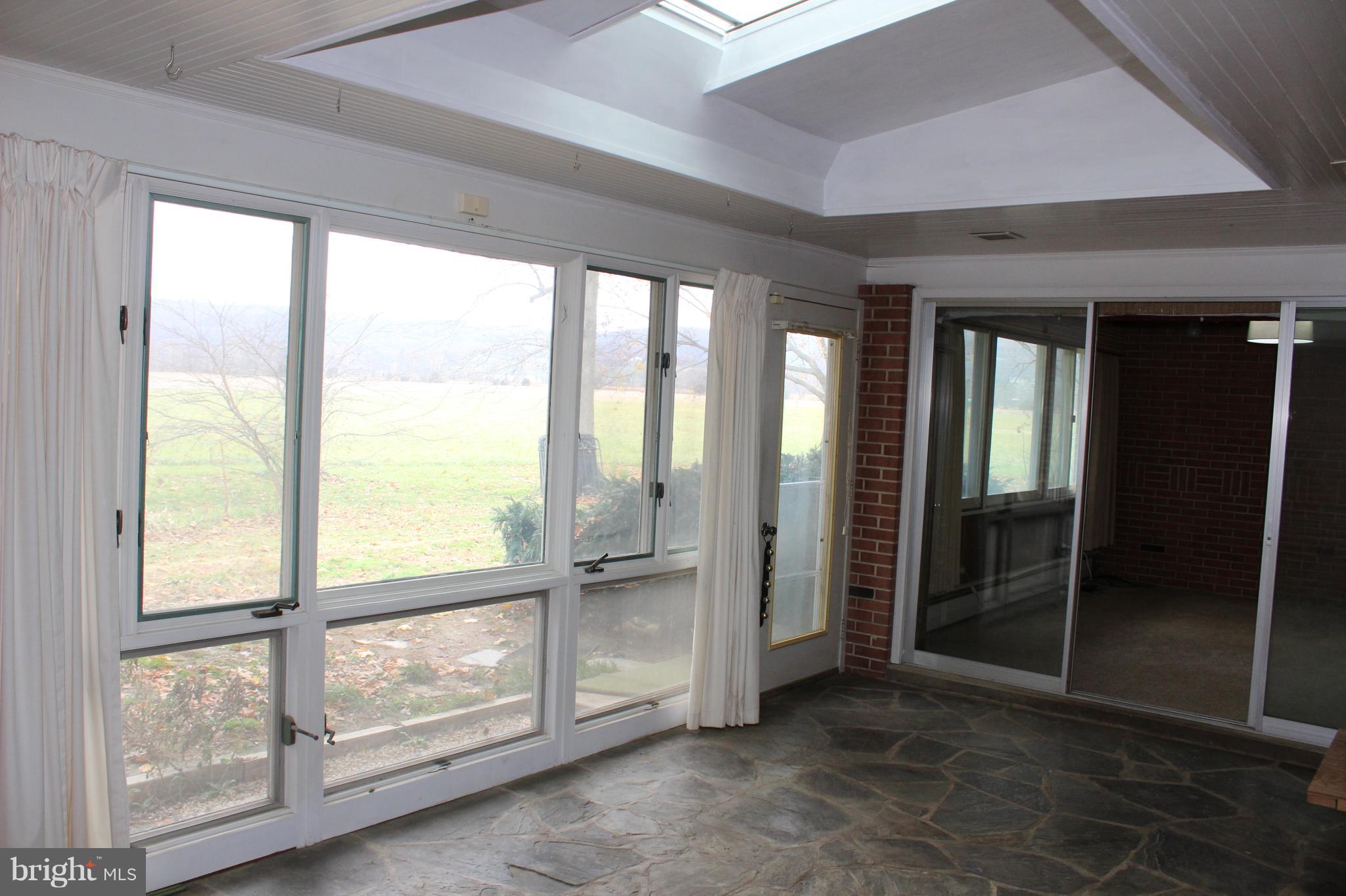 24 Carrolls Tract Road Fairfield, PA 17320 - Photo 25 of 47 Rear Enclosed Four Seasons Room