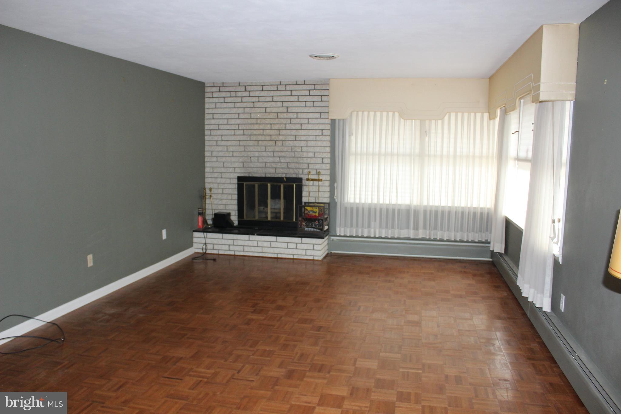 24 Carrolls Tract Road Fairfield, PA 17320 - Photo 10 of 47 Living Room with wood-burning fireplace