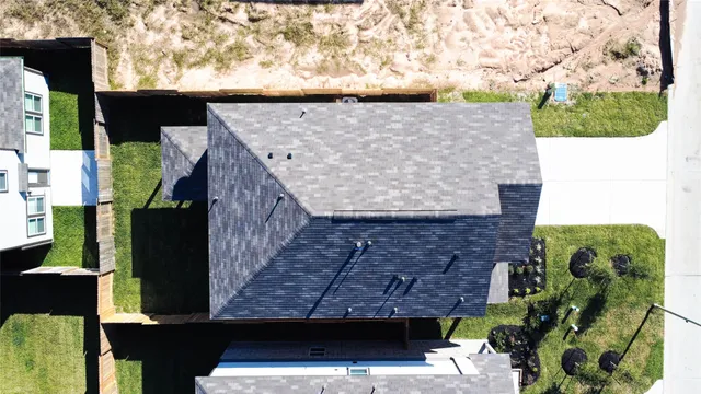 a view of a balcony with wooden floor