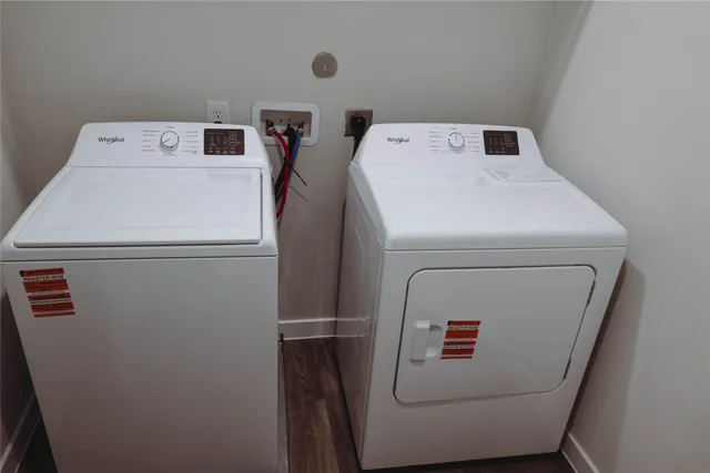 a utility room with dryer and washer