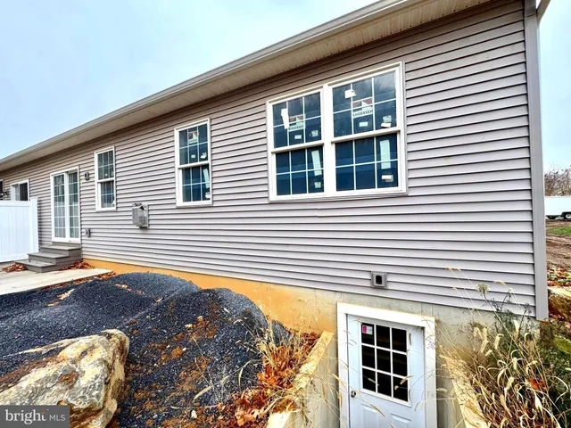 a view of a house with a street