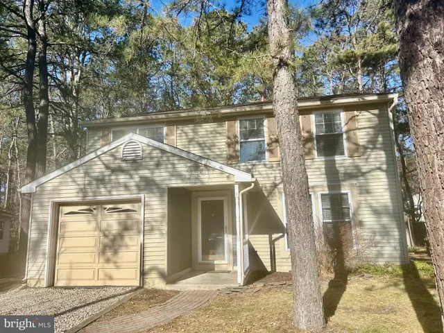 a view of entrance gate of a house