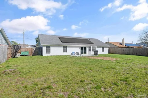 a aerial view of a house with garden