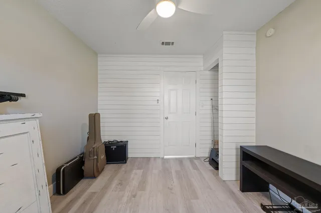 a view of a storage & utility room with a sink