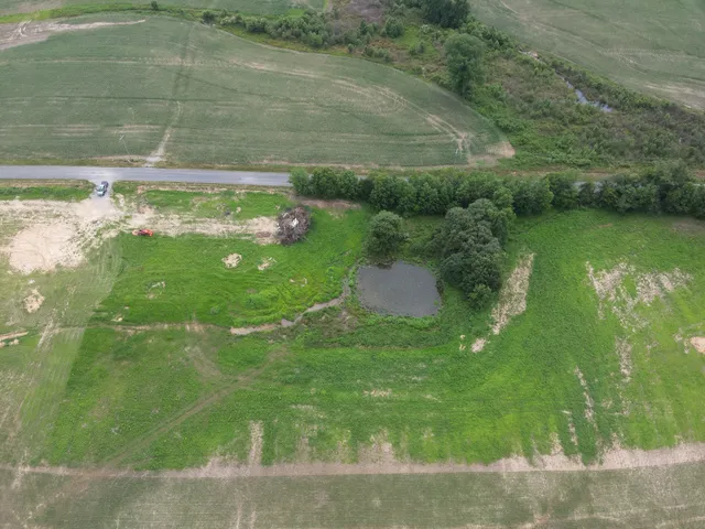 a view of a lake from a yard