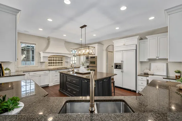 a living room with furniture a window and a fireplace