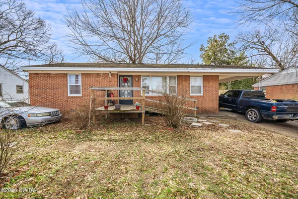 a view of a house with a patio