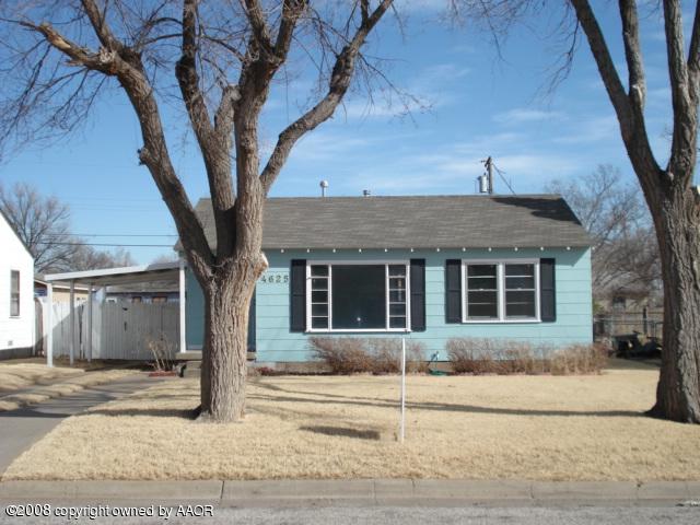 4625 South Lipscomb Street Amarillo, TX 79110 - Photo 1 of 1 a front view of a house with a yard