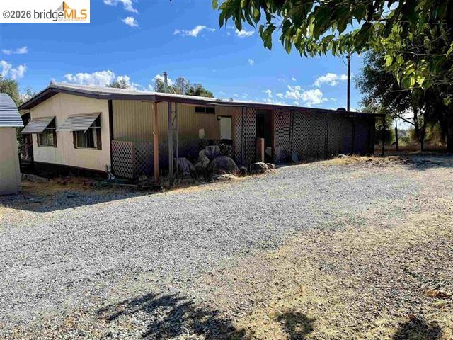 19361 Cherokee Road Tuolumne, CA 95379 - Photo 1 of 41 a view of a house with a yard