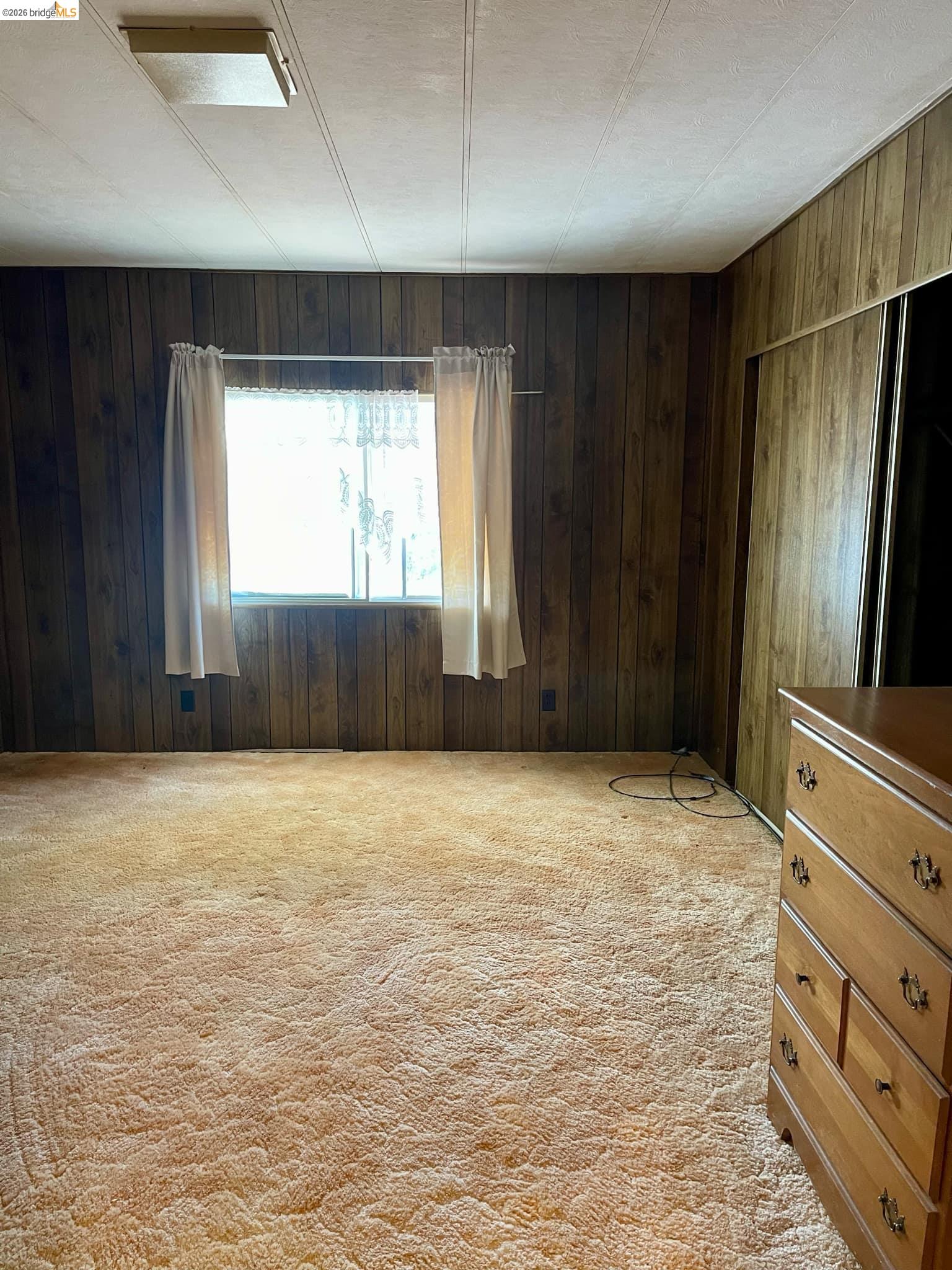 19361 Cherokee Road Tuolumne, CA 95379 - Photo 11 of 41 a view of an empty room with a window