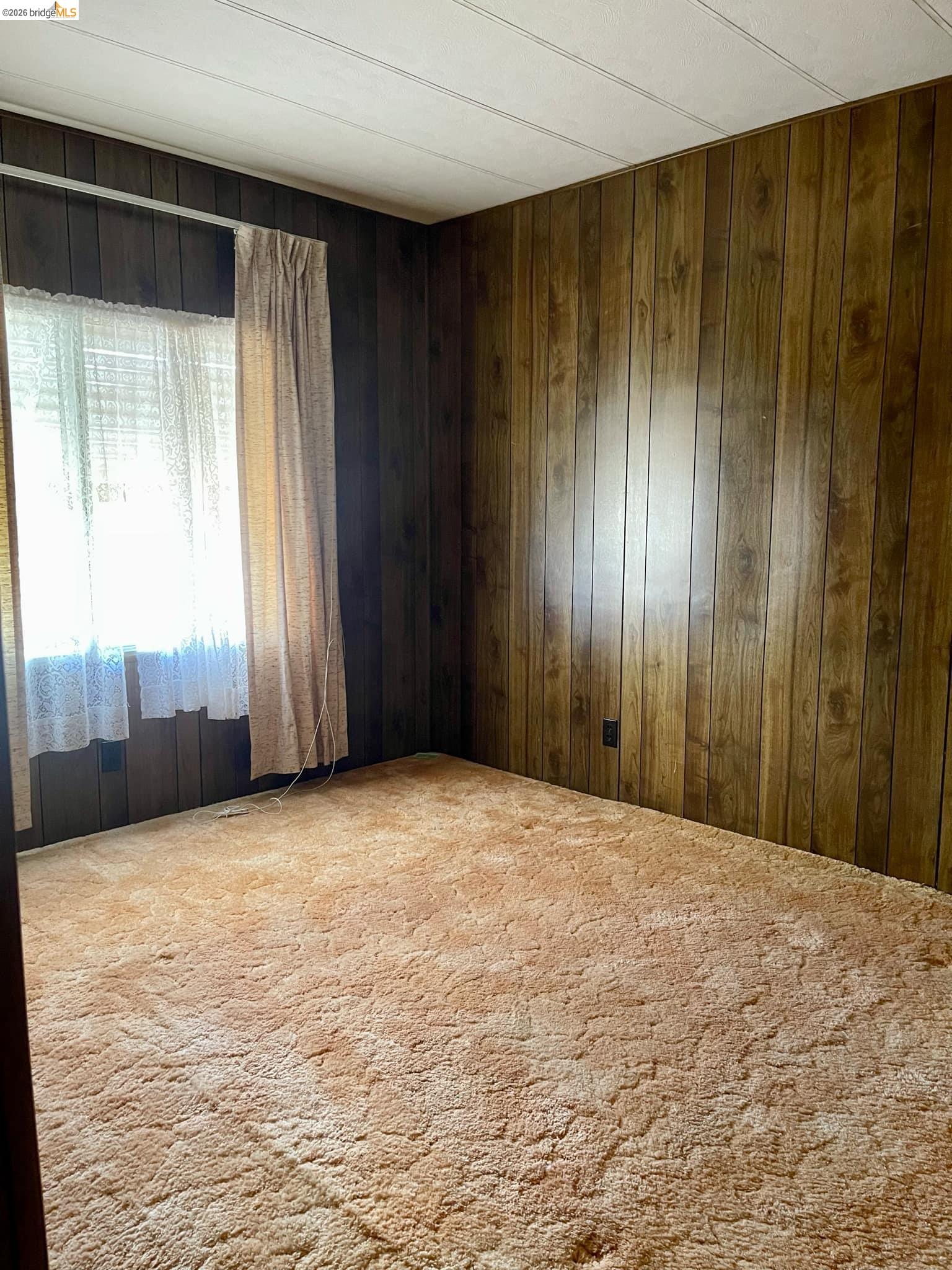 19361 Cherokee Road Tuolumne, CA 95379 - Photo 15 of 41 a view of an empty room with a window