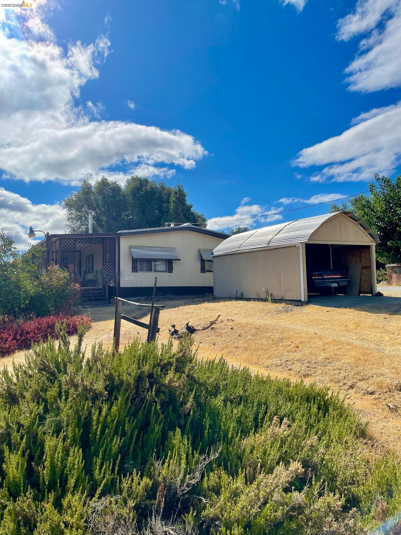 19361 Cherokee Road Tuolumne, CA 95379 - Photo 21 of 41 a house view with a garden space