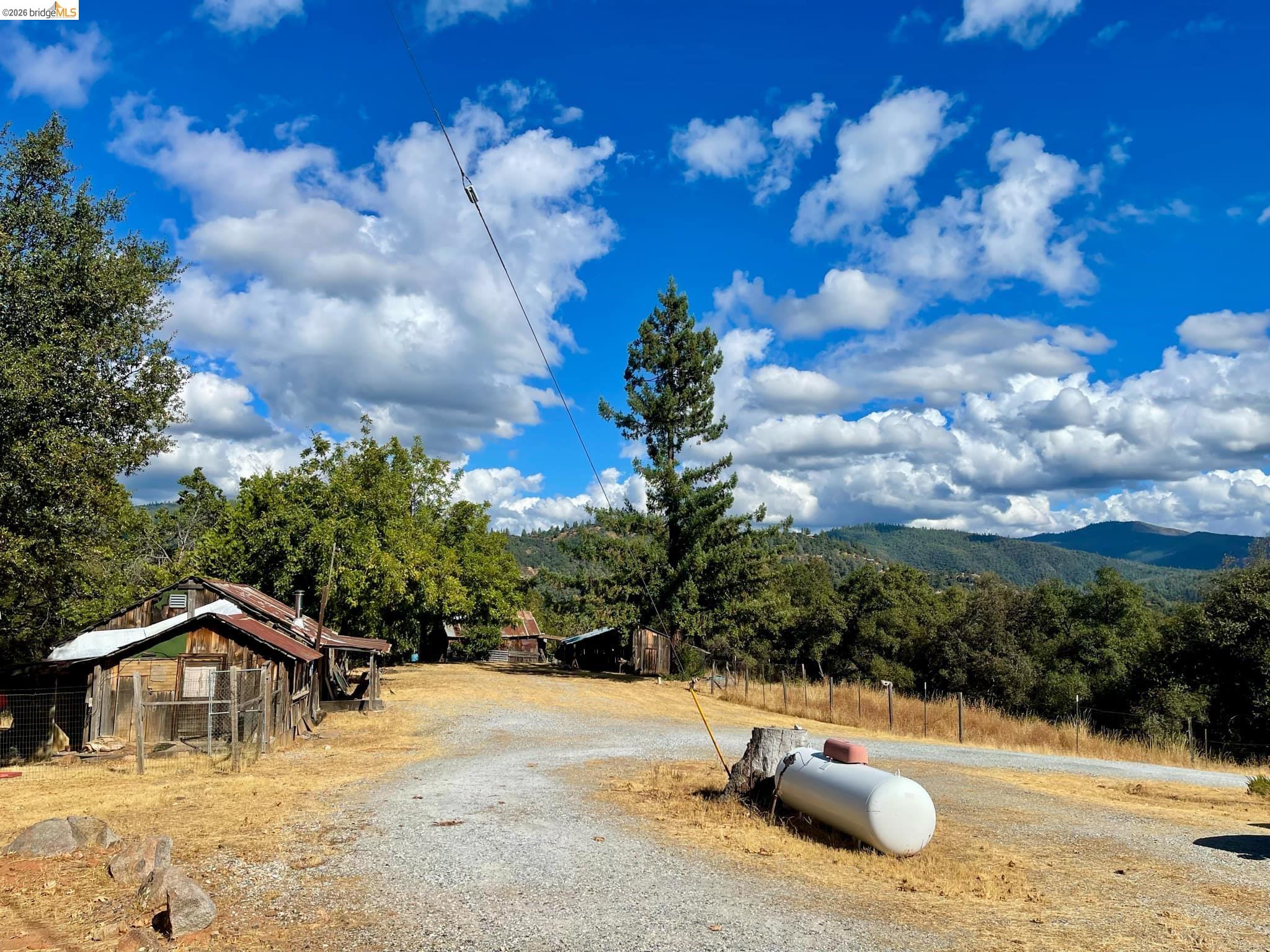 19361 Cherokee Road Tuolumne, CA 95379 - Photo 22 of 41 a view of swimming pool with a yard
