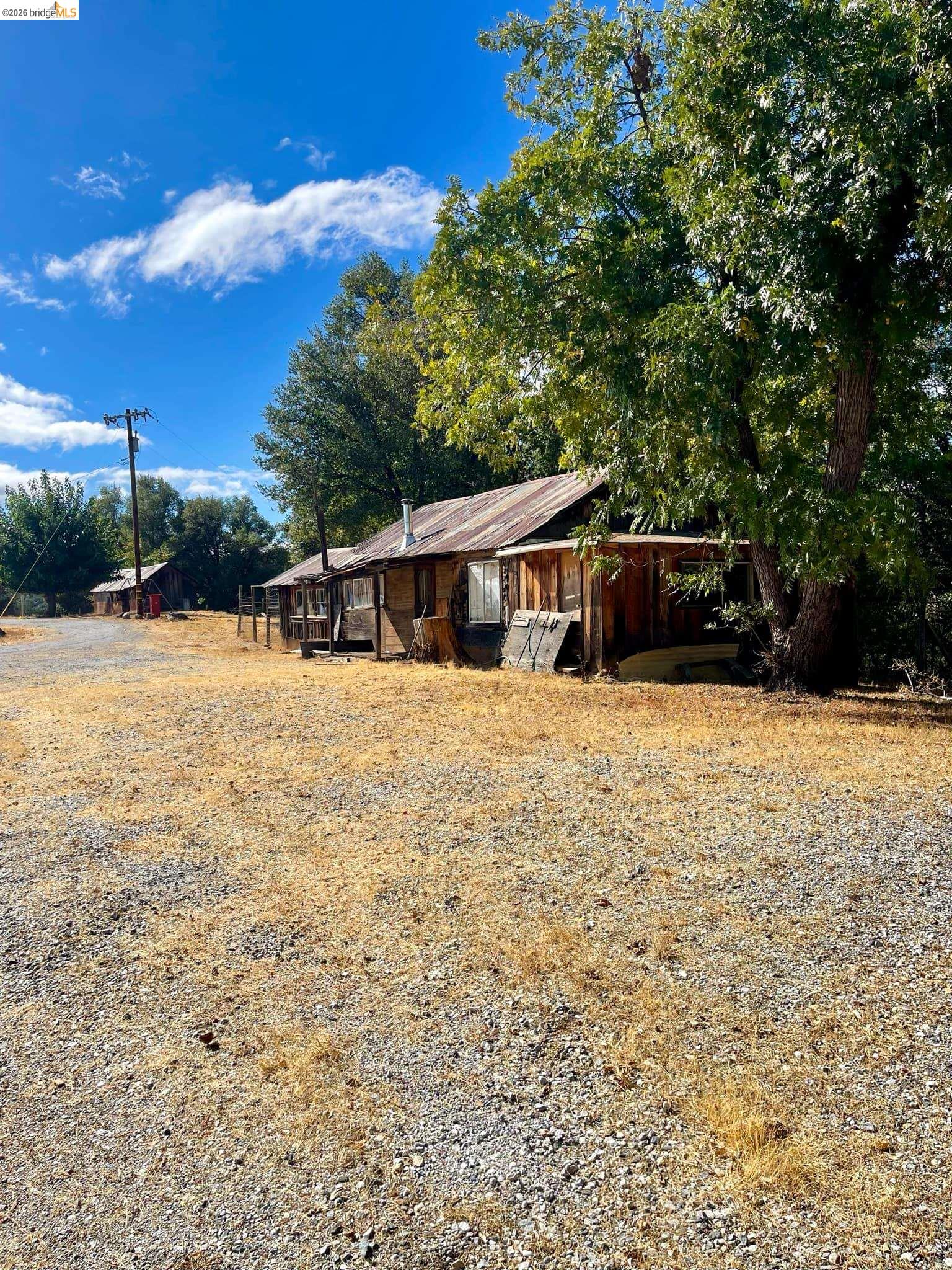19361 Cherokee Road Tuolumne, CA 95379 - Photo 25 of 41 a view of a house with yard and sitting area