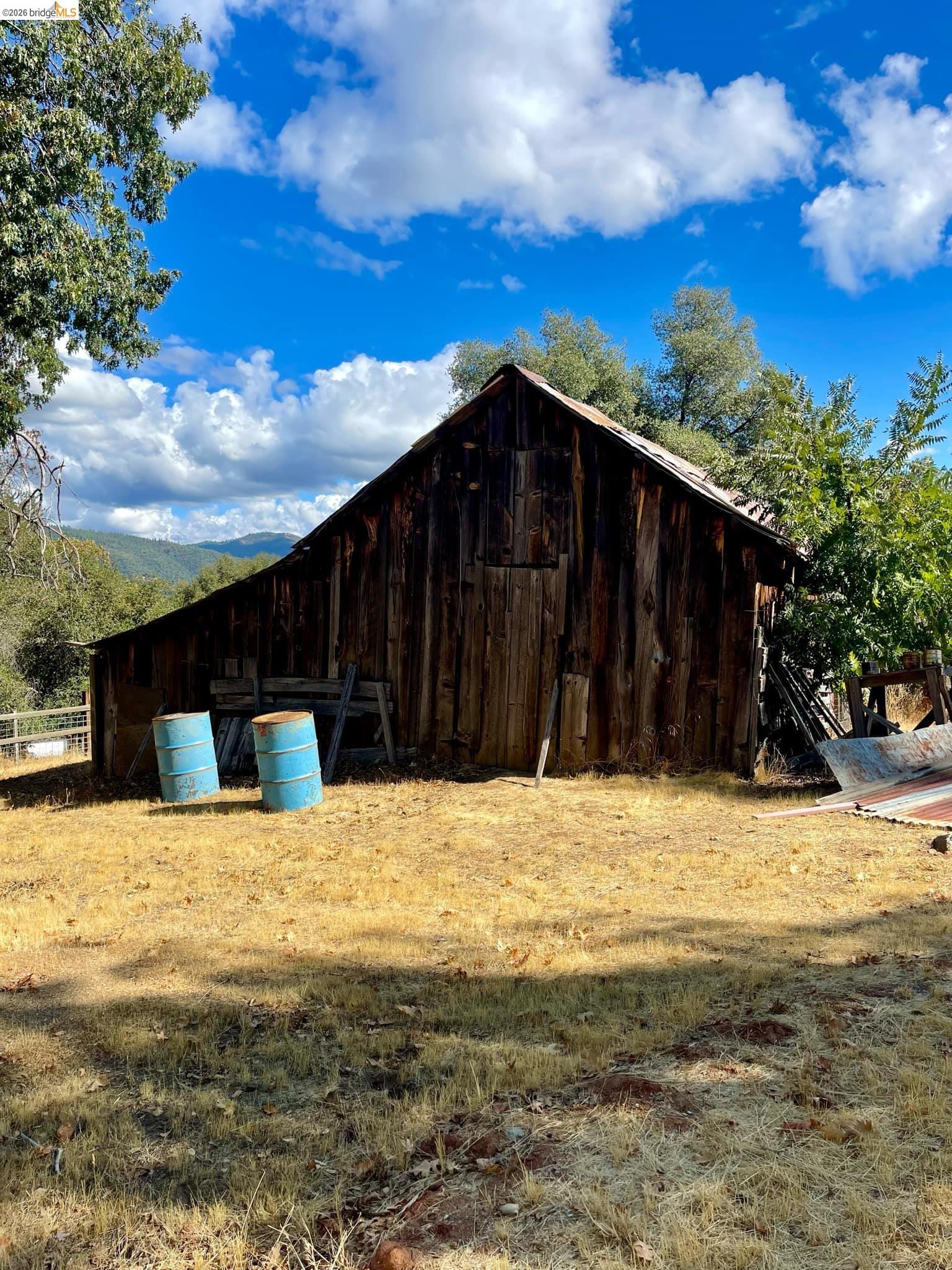 19361 Cherokee Road Tuolumne, CA 95379 - Photo 28 of 41 a view of a house with a yard
