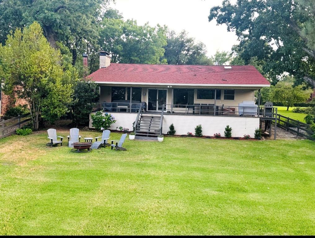 111 Ridgeoak Way Tool, TX 75143 - Photo 1 of 24 a view of a house with a yard porch and sitting area
