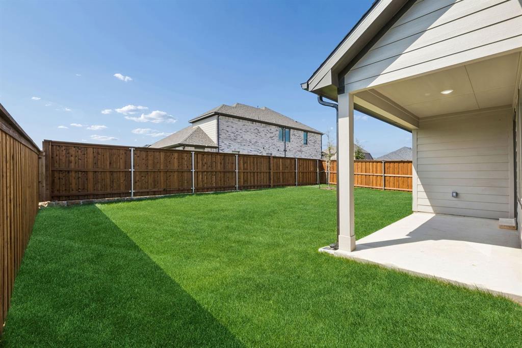 1116 Del Rio Drive Lavon, TX 75166 - Photo 32 of 40 Patio in the Oscar home plan by Trophy Signature Homes – REPRESENTATIVE PHOTO