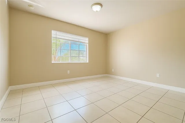 a view of an empty room and window