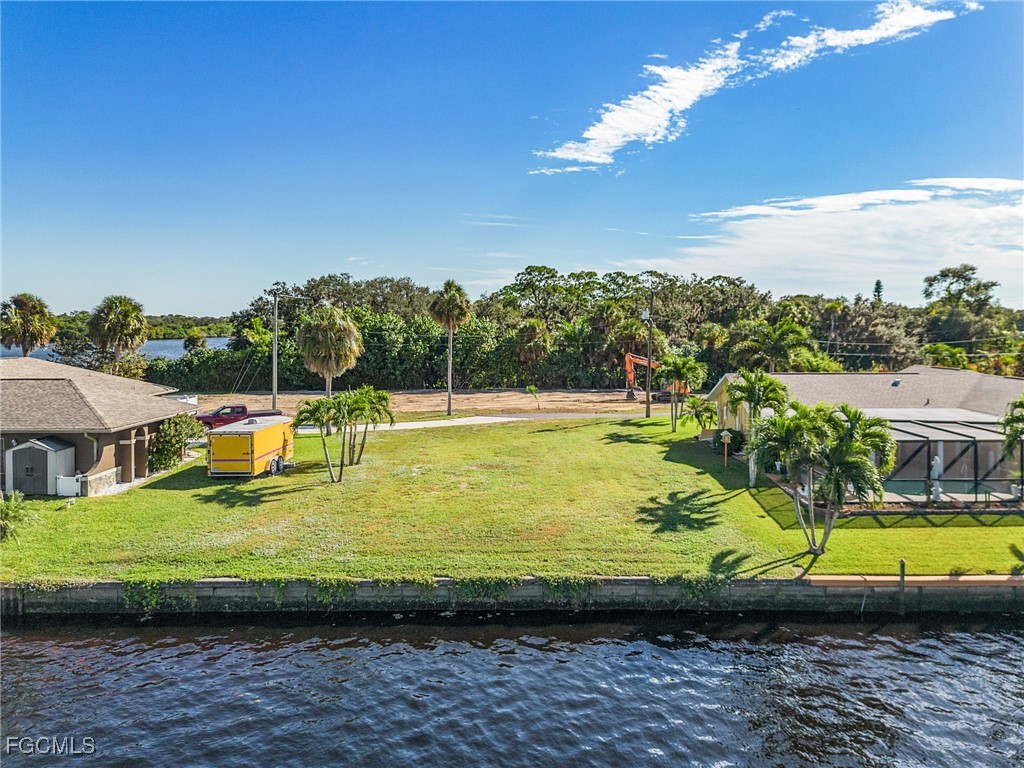 2193 River Road Fort Myers, FL 33905 - Photo 11 of 19 a view of a swimming pool with a patio