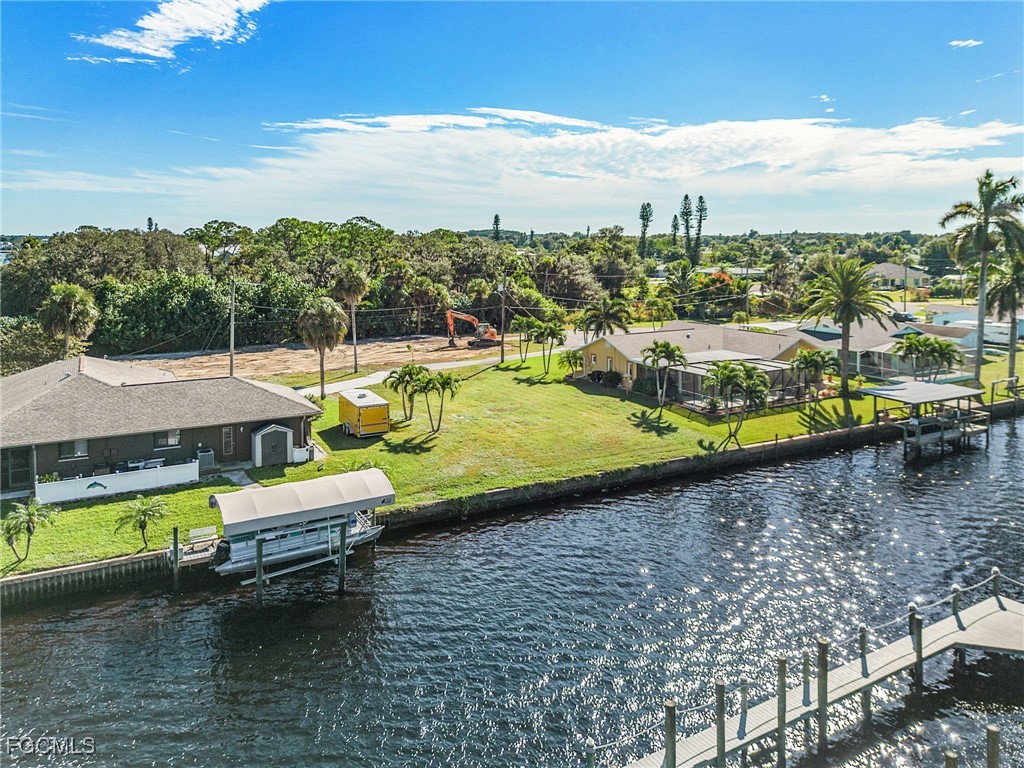 2193 River Road Fort Myers, FL 33905 - Photo 12 of 19 a view of a lake with lawn chairs