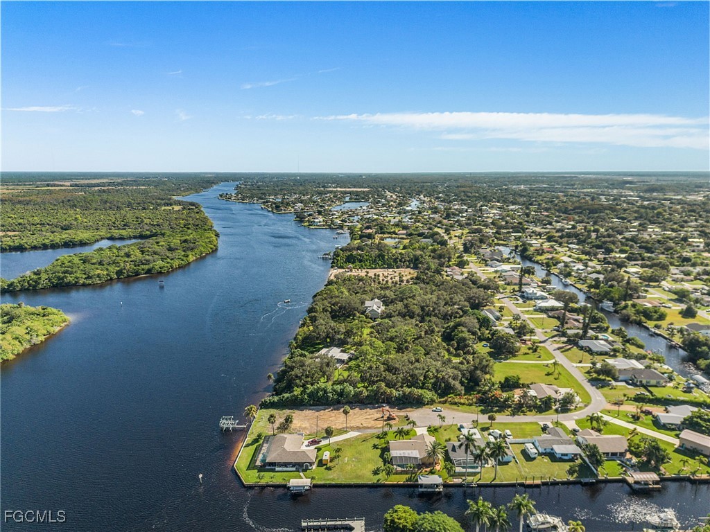 2193 River Road Fort Myers, FL 33905 - Photo 18 of 19 an aerial view of a house with a lake view