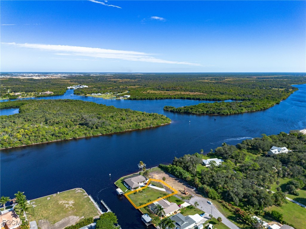 2193 River Road Fort Myers, FL 33905 - Photo 5 of 19 an aerial view of a houses with a lake view