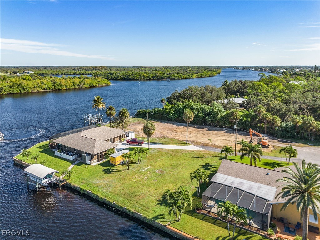 2193 River Road Fort Myers, FL 33905 - Photo 10 of 19 an aerial view of a house with swimming pool and outdoor seating