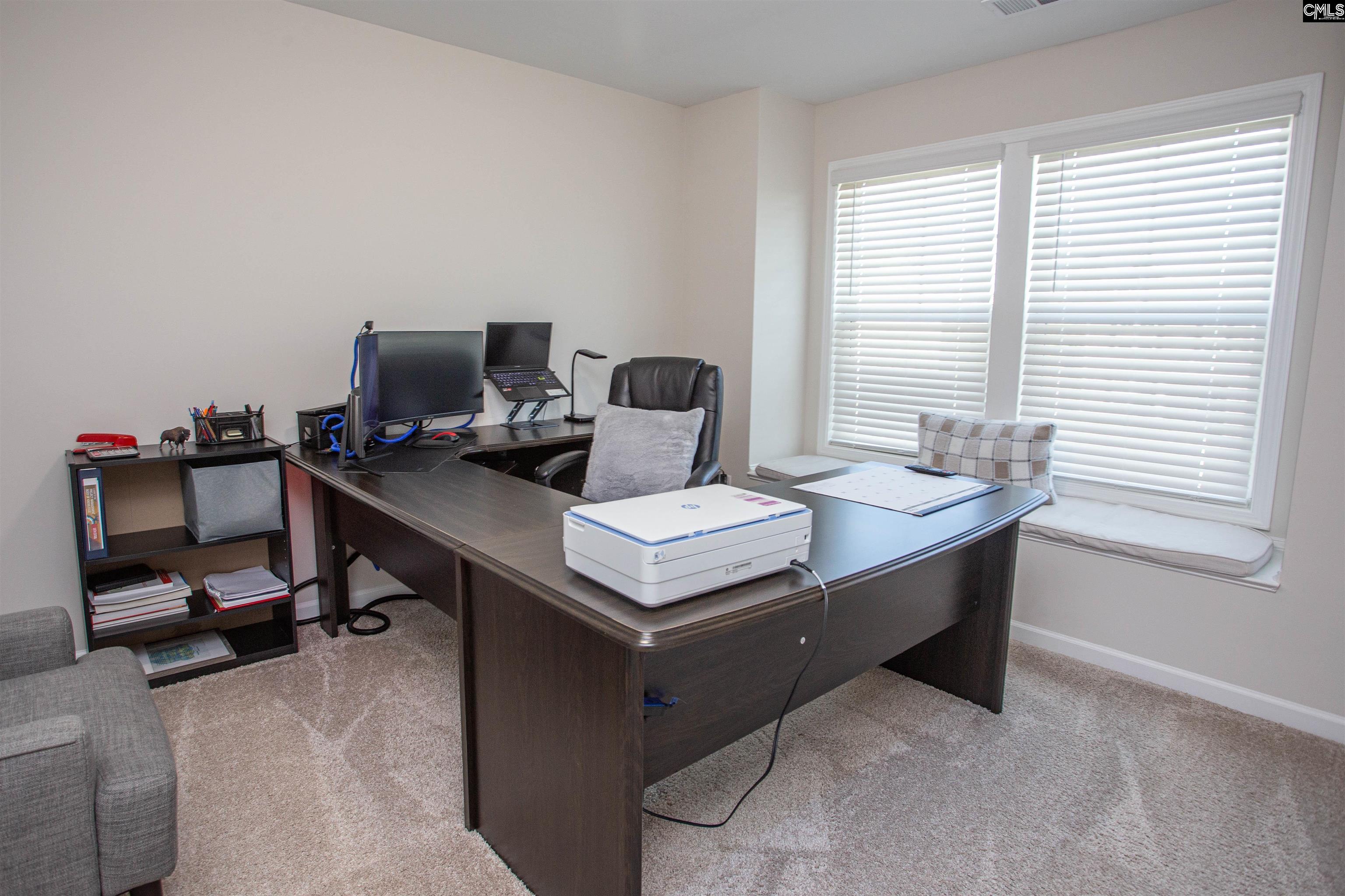 272 Shadowbrook Way Camden, SC 29020 - Photo 25 of 43 a view of a workspace with furniture and a window