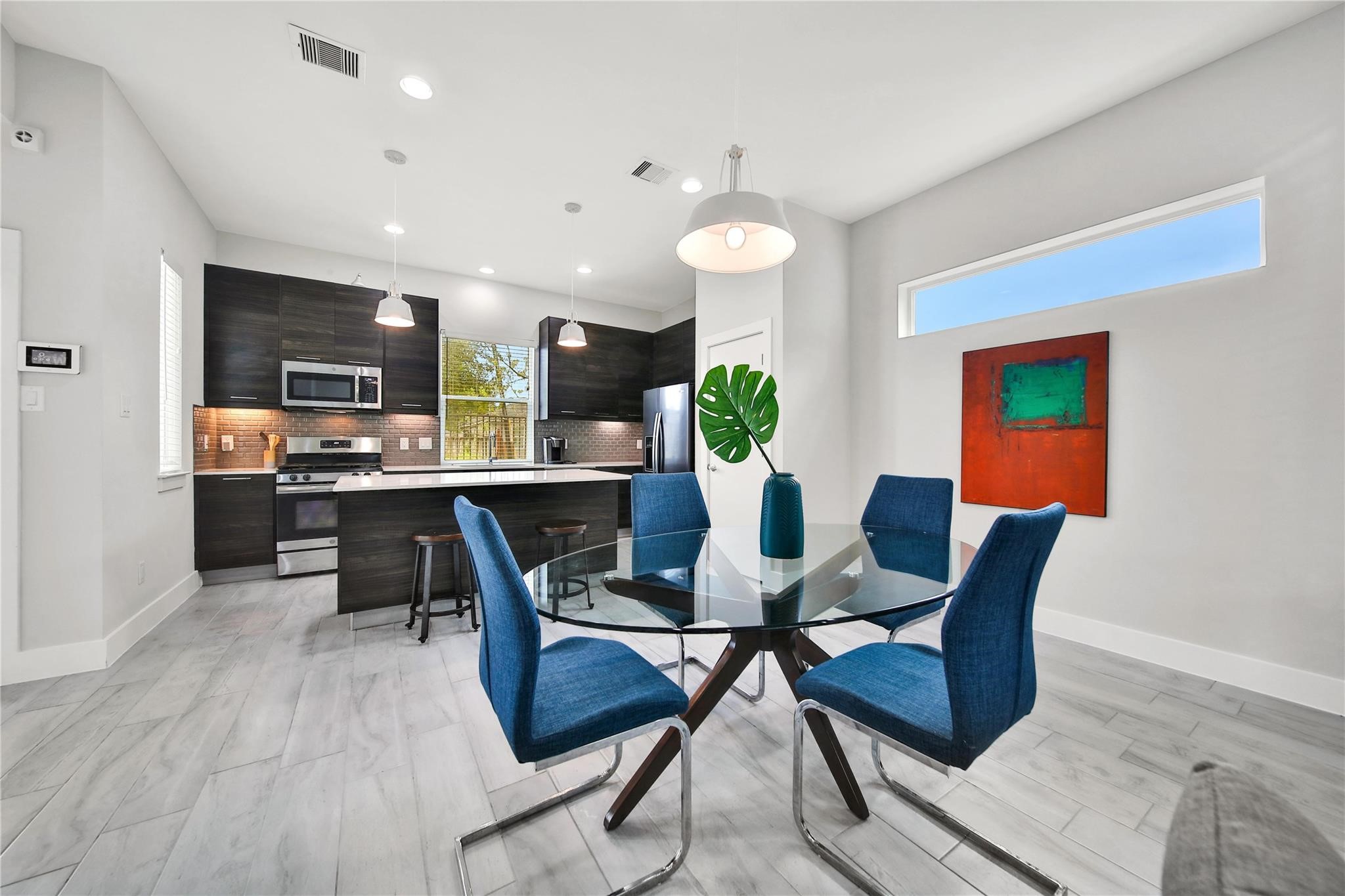2314 Gagne Street Houston, TX 77020 - Photo 4 of 28 a view of a dining room with furniture