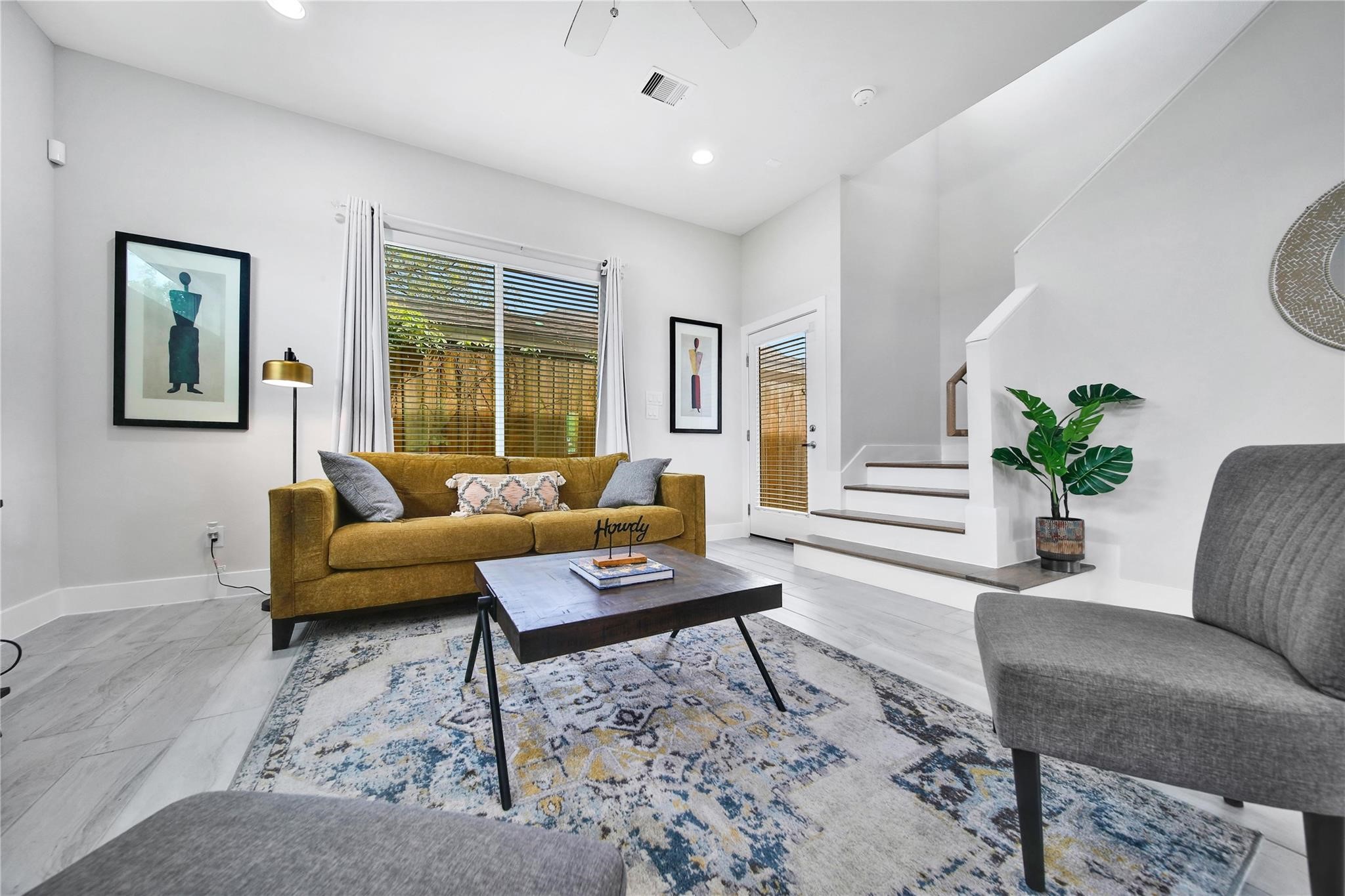 2314 Gagne Street Houston, TX 77020 - Photo 7 of 28 a living room with furniture and a large window