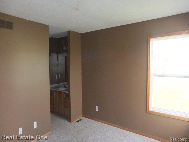 8581 Bergin Road Howell, MI 48843 - Photo 14 of 25 261-813145 Master Bedroom.jpg