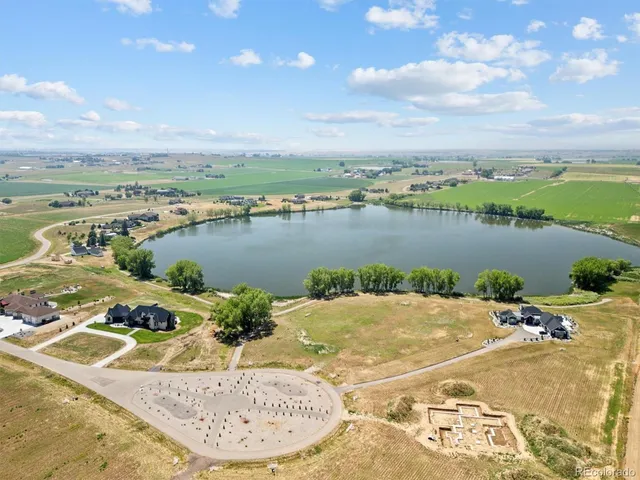 a view of a lake with a outdoor space